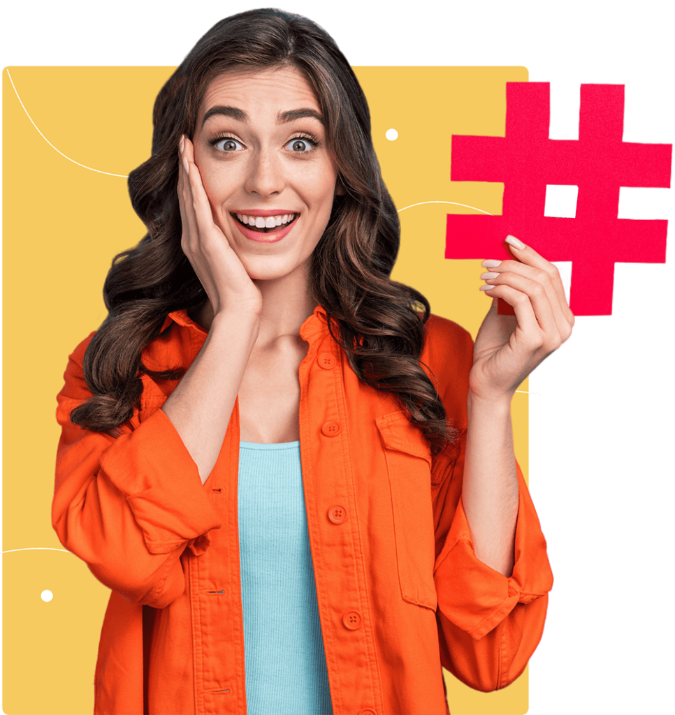 Excited woman holding a hashtag symbol, representing BrandMarkety's social media strategies in Bangalore.