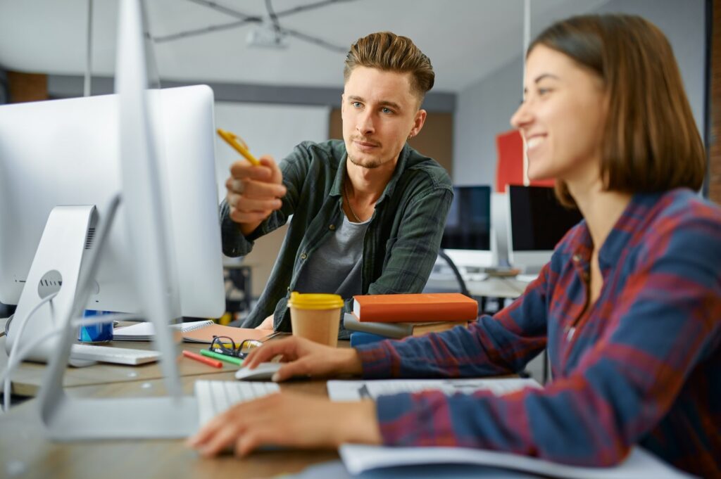 two it specialists works on computers in office 2021 08 30 12 16 58 utc min