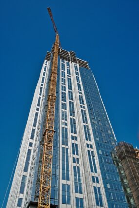 building, skyscraper, construction, crane, site, city, high building, office building, real estate, residential building, apartment, building exterior, facade